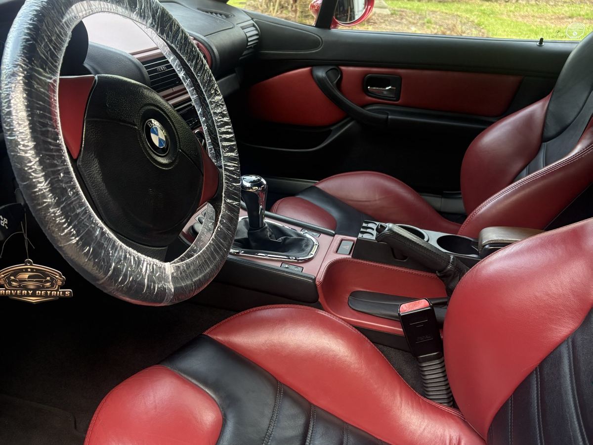 BMW Z3 red and black leather interior after conditioning