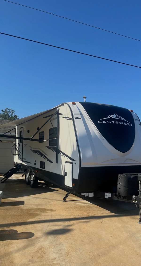East to West travel trailer washed and detailed, ready for sale