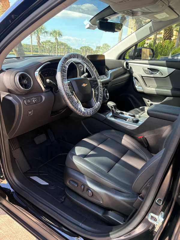 Chevy Traverse interior after detailing — leather seats and dashboard cleaned and protected